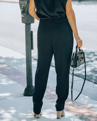 Uncommon Times Pocketed Asymmetrical Button Pants